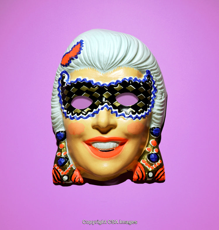 Colorful Plastic Masquerade Mask on Bright Pink Background