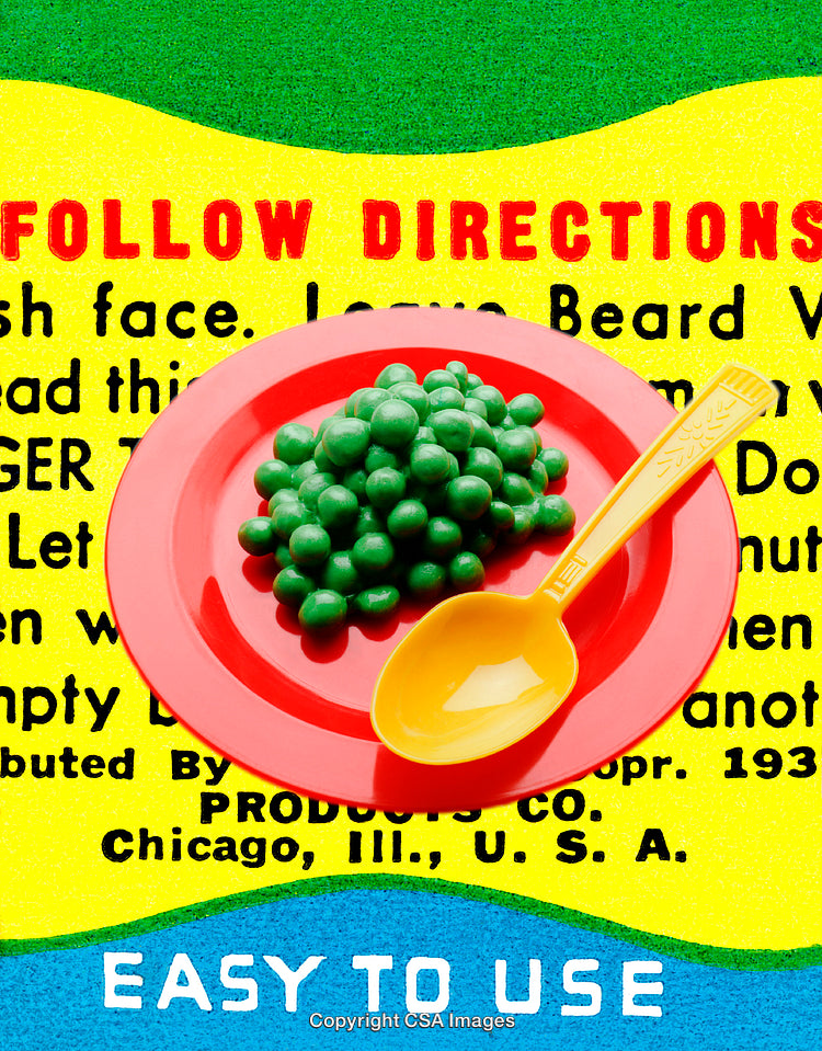 Colorful Arrangement of Plastic Toy Peas and Spoon on a Graphic Background