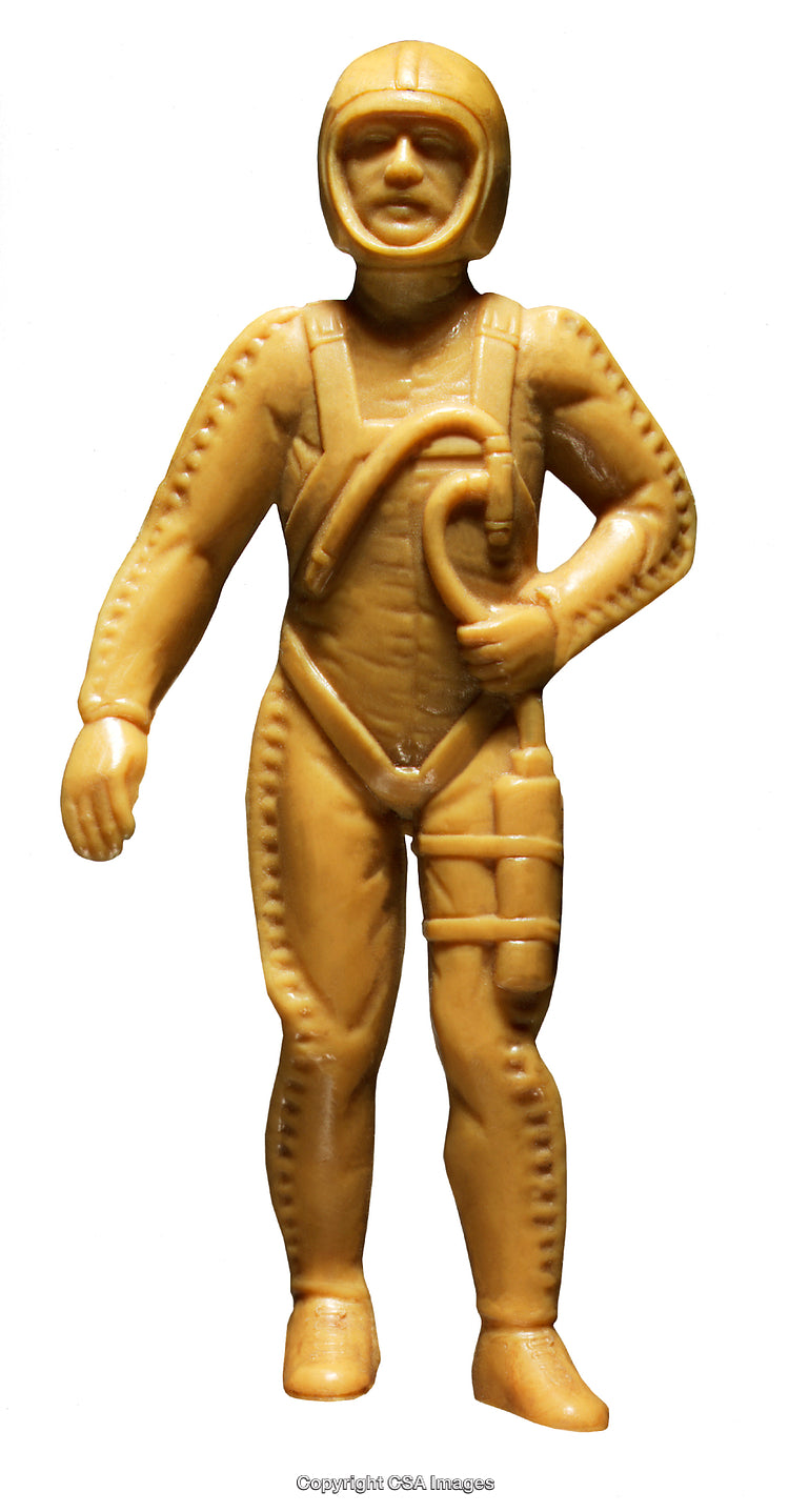 Vintage Yellow Plastic Figurine of a Retro Space Explorer