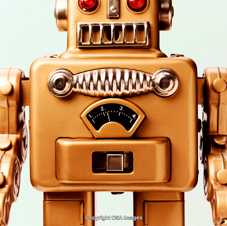 Close-Up of a Vintage Golden Robot Toy With Bright Details
