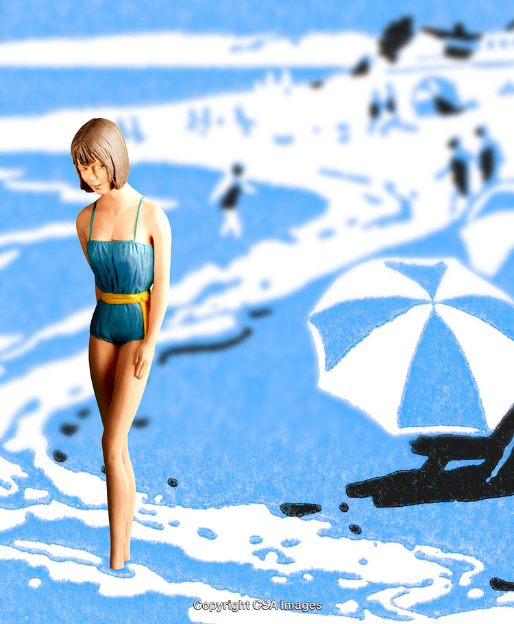 Plastic Figure of Woman on Beach with Blue and White Background