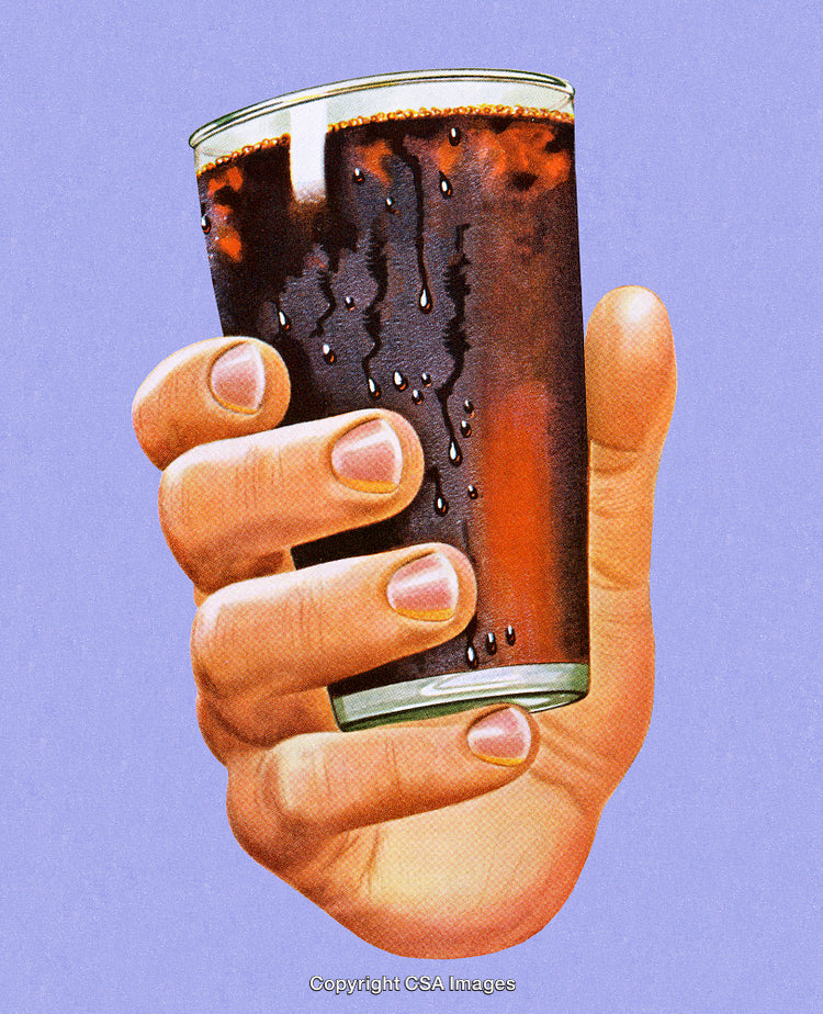 Close-Up of a Hand Holding a Refreshing Glass of Dark Carbonated Beverage