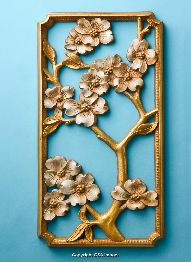 Gold-Plated Floral Frame Against Elegant Light Blue Background