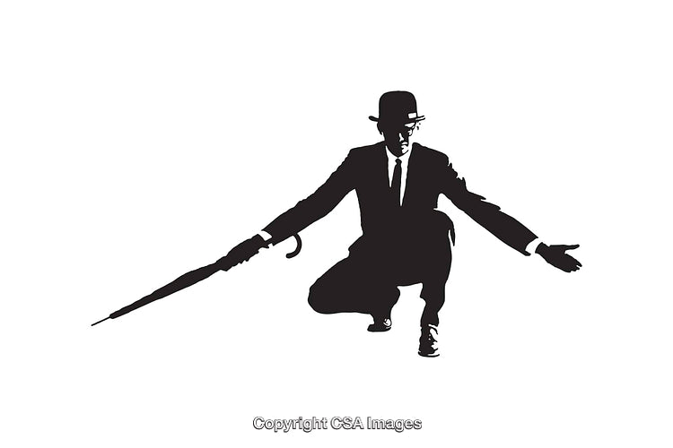 Silhouette of Man In Classic Suit and Hat With Umbrella
