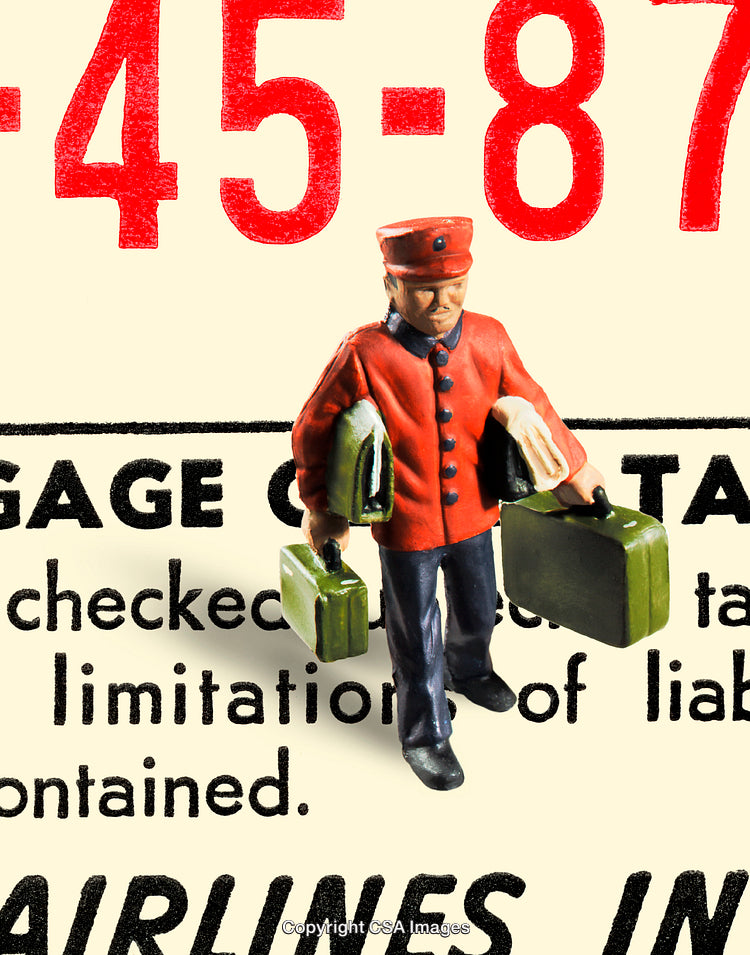 Miniature Bellhop Holding Luggage on a Vintage Airline Poster Background