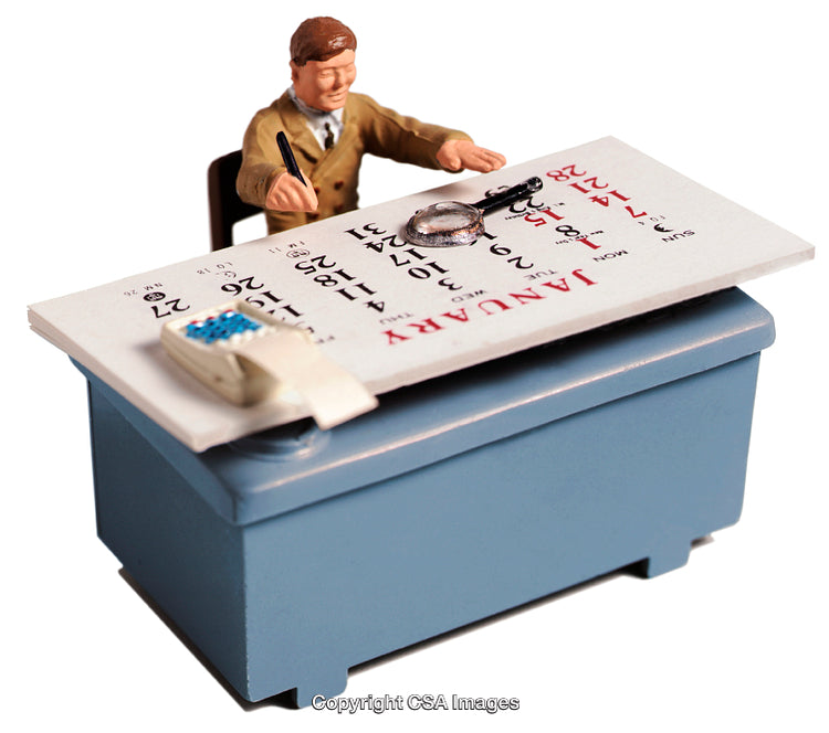Miniature Figurine Writing at Desk With January Calendar Display
