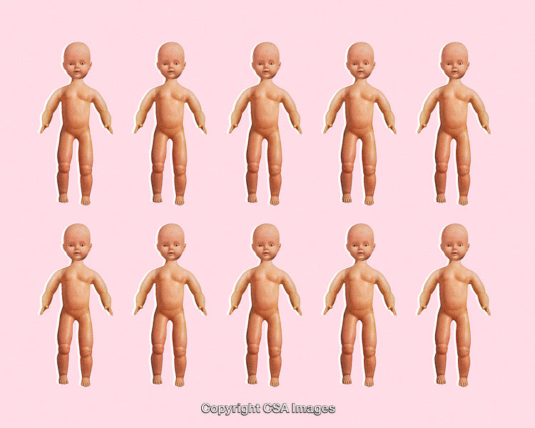 Multiple Vintage Dolls Arranged on Pink Background in Repetitive Pattern Layout