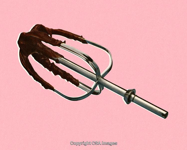 Beater With Chocolate Batter Stylishly Photographed Against a Pink Background