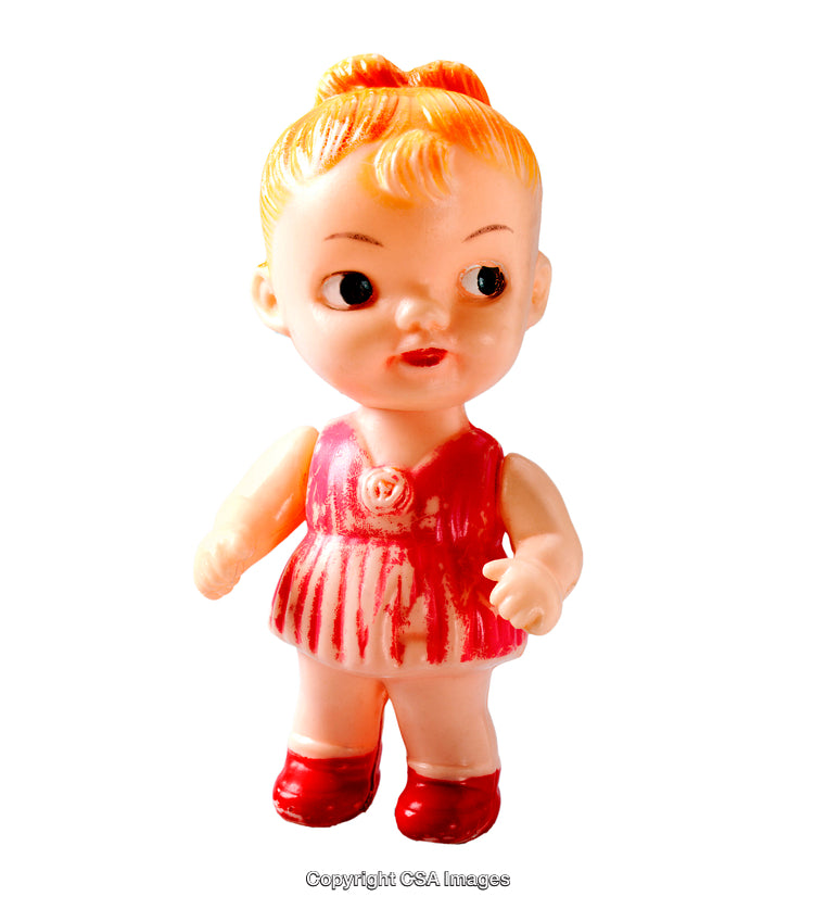 Vintage Plastic Toy Doll In Red Dress And Orange Hair Isolated On White