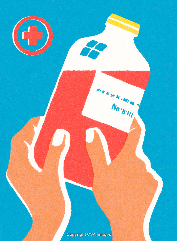 Hands Holding a Medical Medication Bottle with Red Cross Symbol on Blue