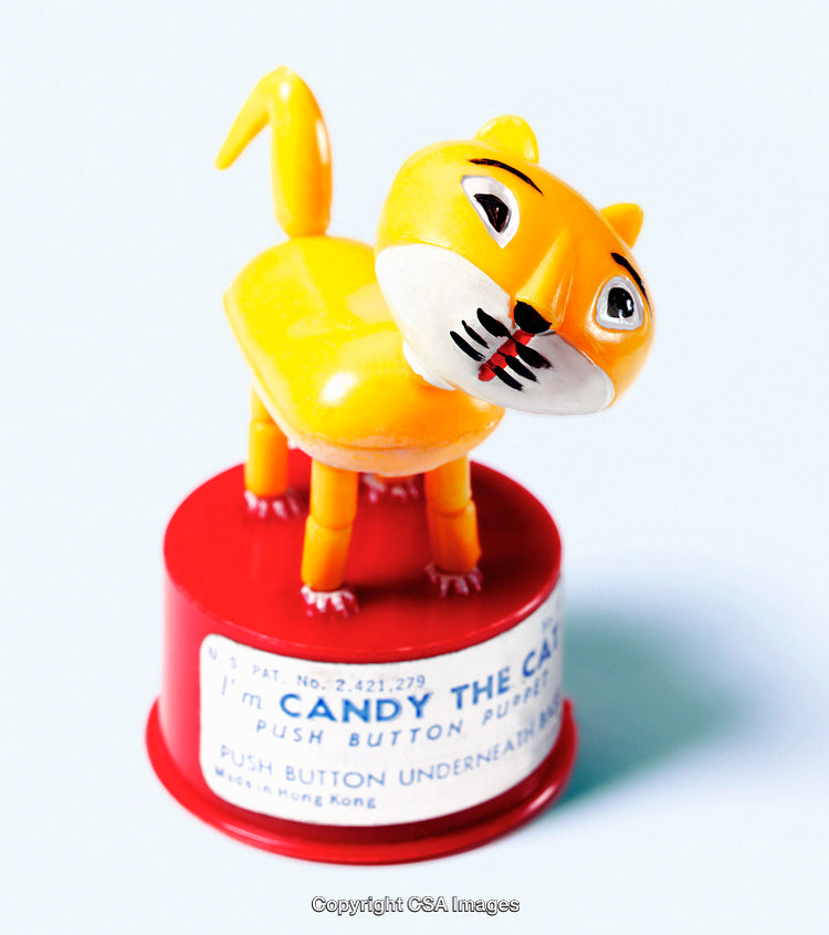 Vintage Yellow Cat Figurine Toy With Label on Red Base
