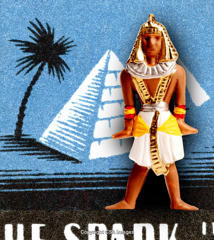 Egyptian Pharaoh Figure Set Against Iconic Pyramid and Desert Background