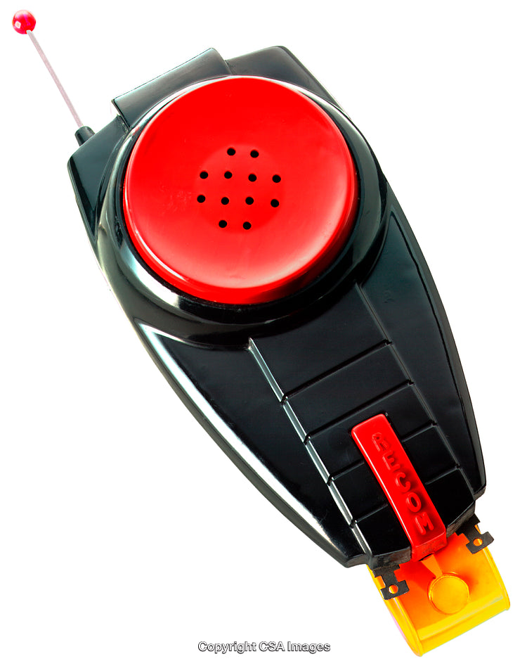 Black and Red Plastic Toy with Antenna on White Background