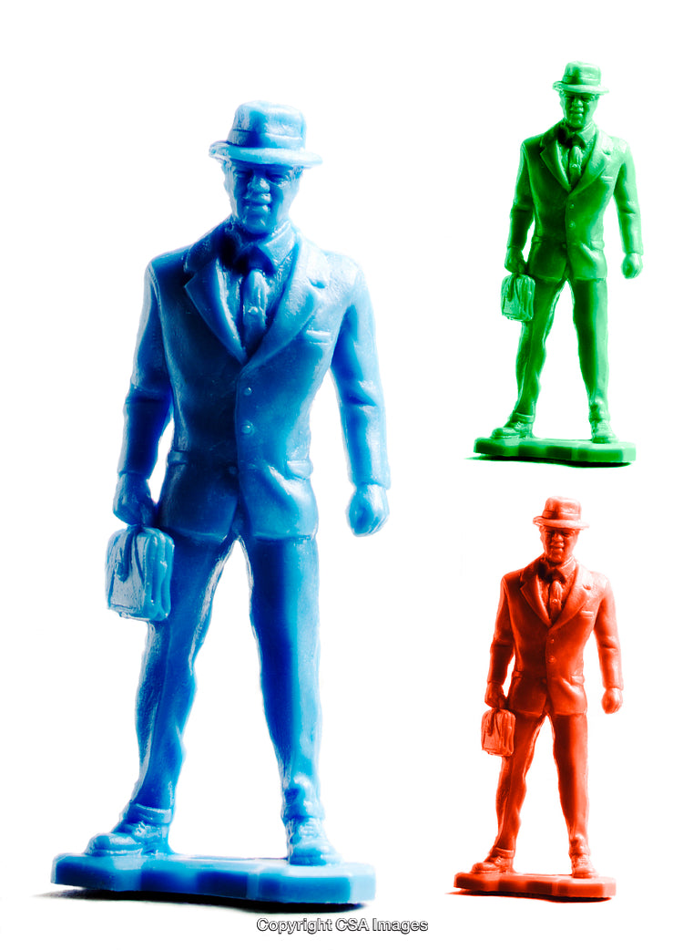 Colorful Plastic Toy Figures of Businessman in Multiple Hues Isolated on White