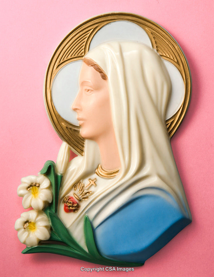 Religious Figurine of Saintly Woman on Pink Background with Flowers