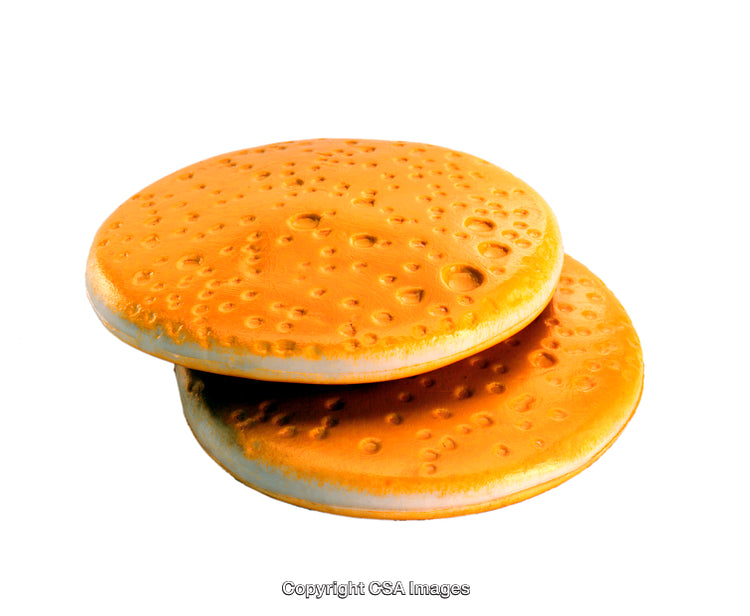 Close-Up of Two Toy Discs with Textured Surfaces