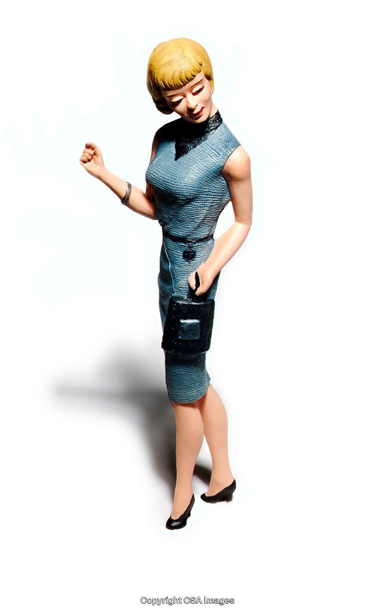 Vintage Style Female Figurine in Blue Dress Holding a Handbag