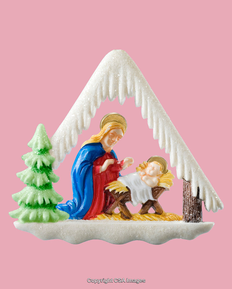 Nativity Scene with Mary, Baby Jesus, and Snowy Decorations on Pink Background