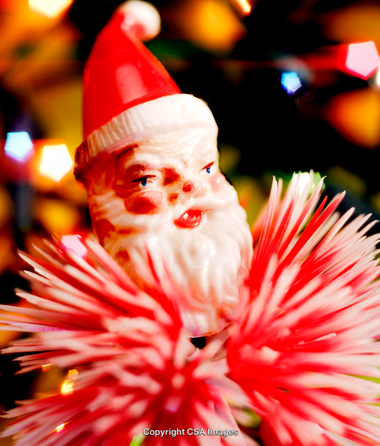 Festive Santa Figurine with Bright Holiday Background