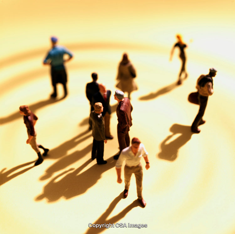 Miniature Figures Casting Shadows Under Bright Light in Abstract Setting
