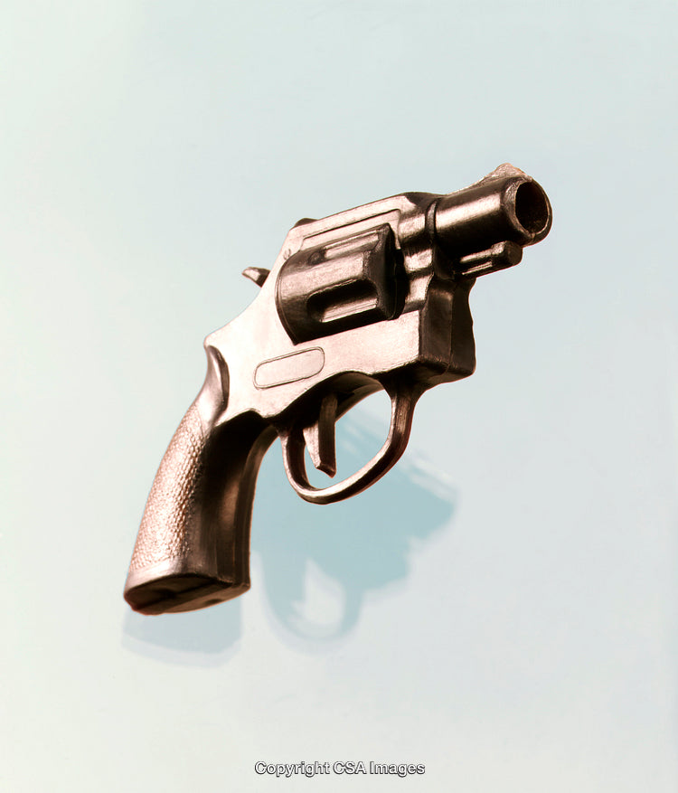 Toy Gun Model Depicting a Plastic Revolver on a Blue Background