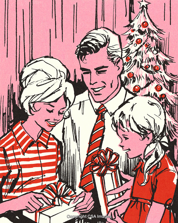 Family Celebrating Christmas Day Exchanging Gifts by the Decorated Tree