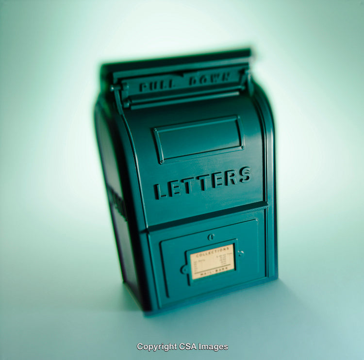 Close-Up of Green Plastic Toy Mailbox With Vintage Labeling