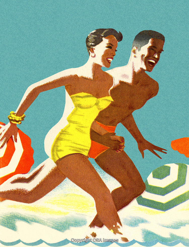 Couple Laughing and Playing in the Ocean Waves at the Beach