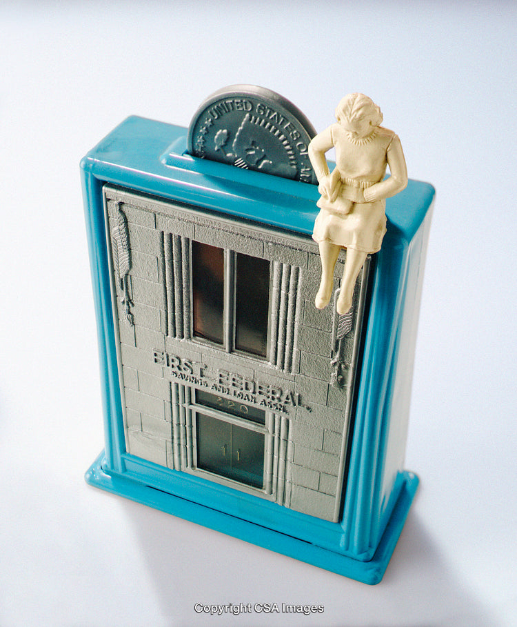 Vintage Toy Coin Bank Featuring Miniature Building and Sculpted Figurine