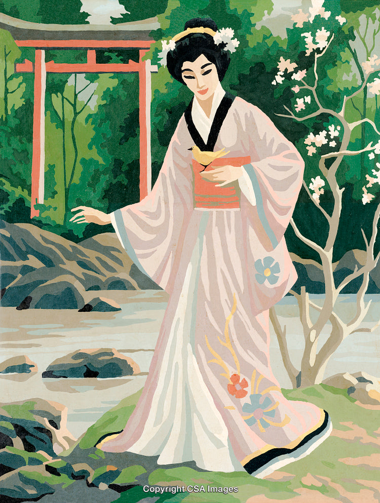 Traditional Japanese Woman in Nature with Beautiful Dress