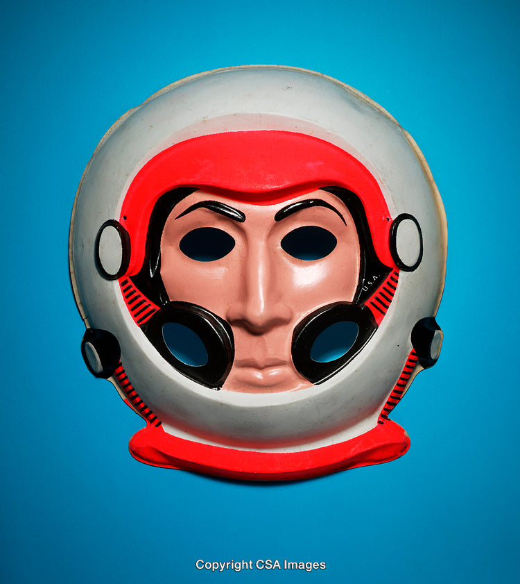 Vintage Space-Themed Mask Against Bright Blue Background
