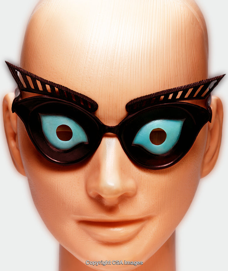 Quirky Toy Featuring Unique Eyeglasses and Stylized Facial Details