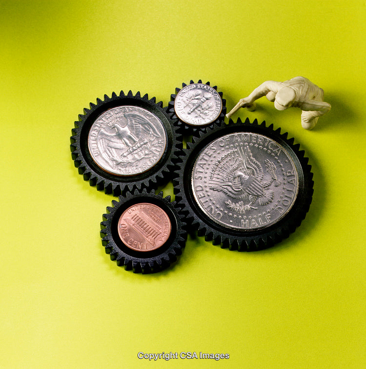 Conceptual Arrangement of Coins With Gears and Figurine on Green Background