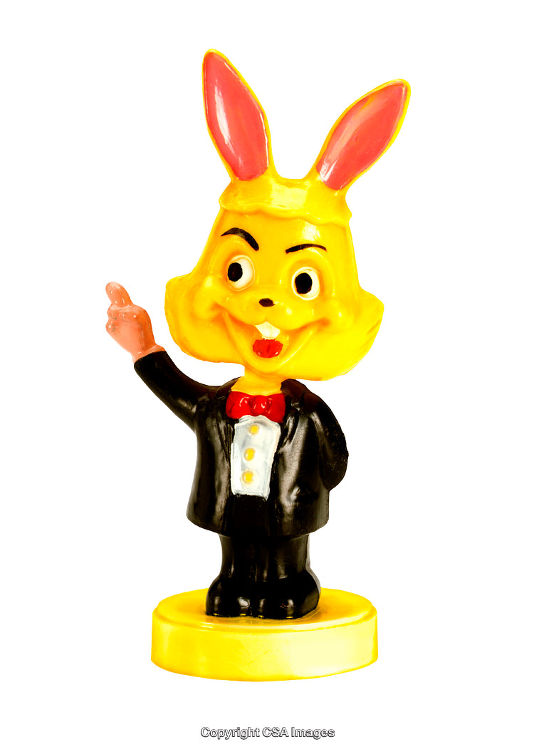 Colorful Plastic Rabbit Figurine in Formal Dress Offering a Cheerful Gesture