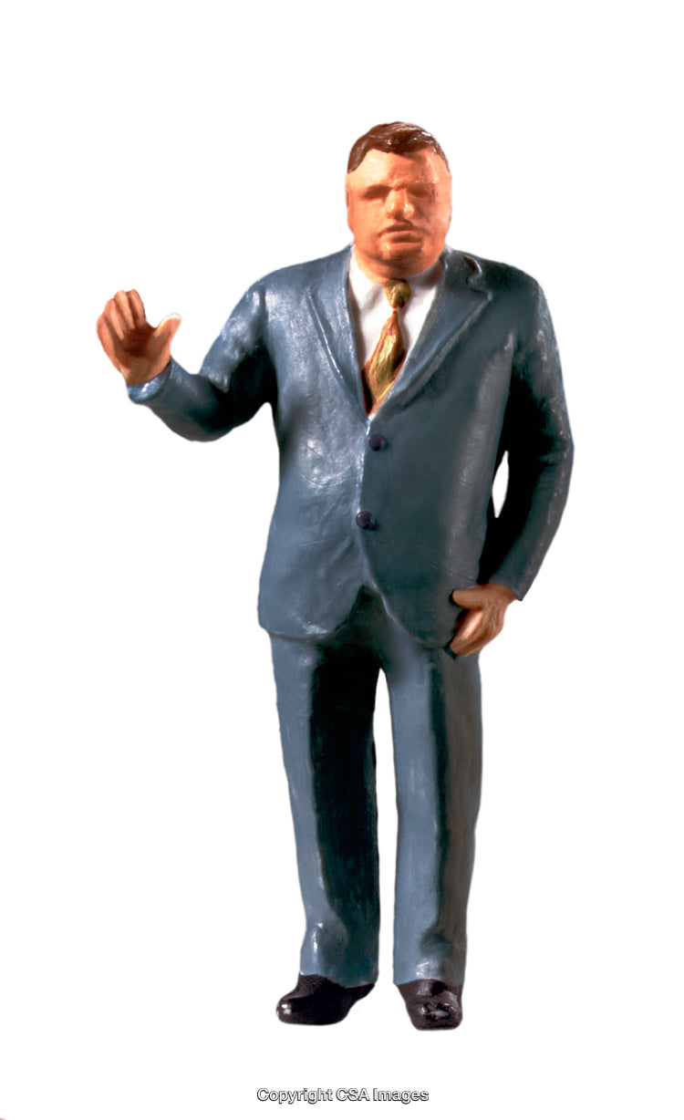 Standing Businessman Figurine Wearing Tie and Suit Isolated on White Background