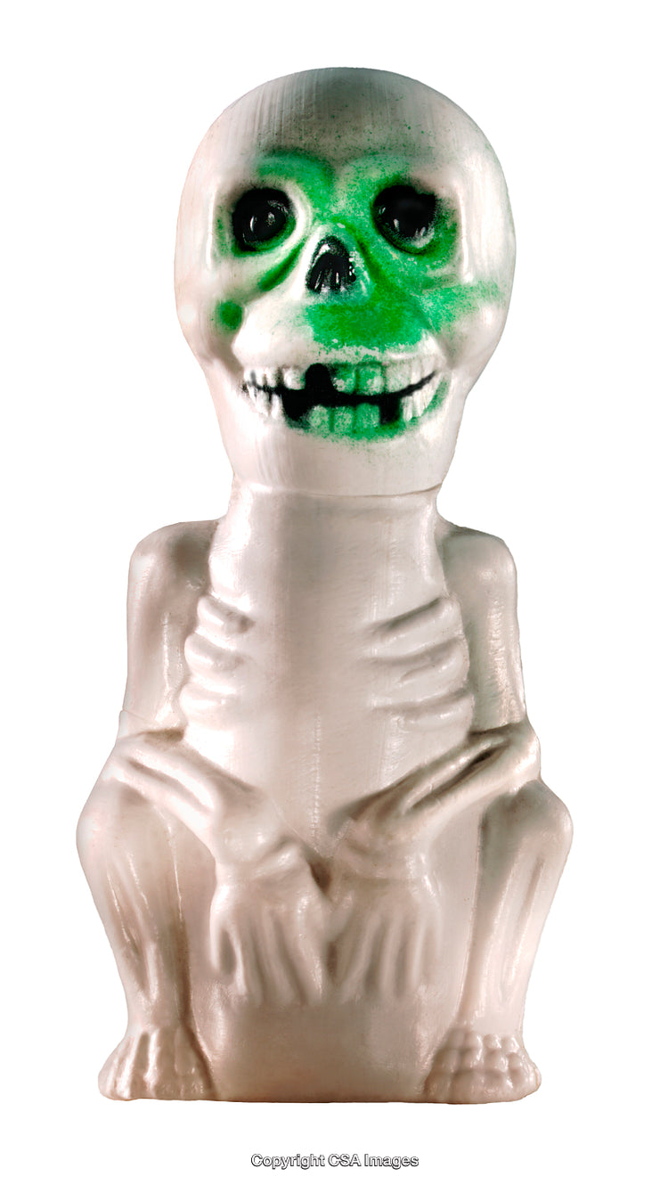 Small Plastic Toy Skeleton with Green Highlights and Hollow Eyes