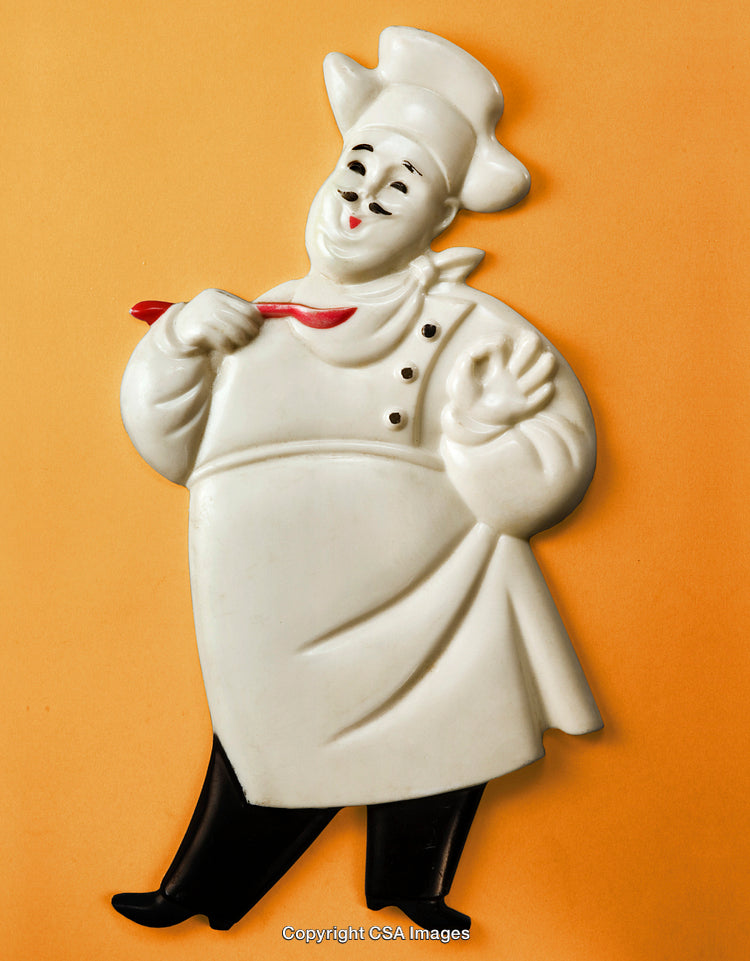 Cheerful Chef Decor Figure With White Apron and Red Spoon on Orange Background