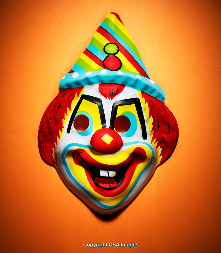 Colorful Clown Mask on Vibrant Orange Background
