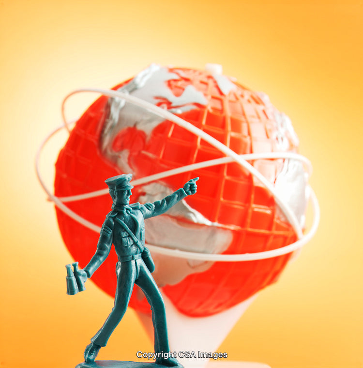 Toy Soldier Figurine in Front of Abstract Globe Representation