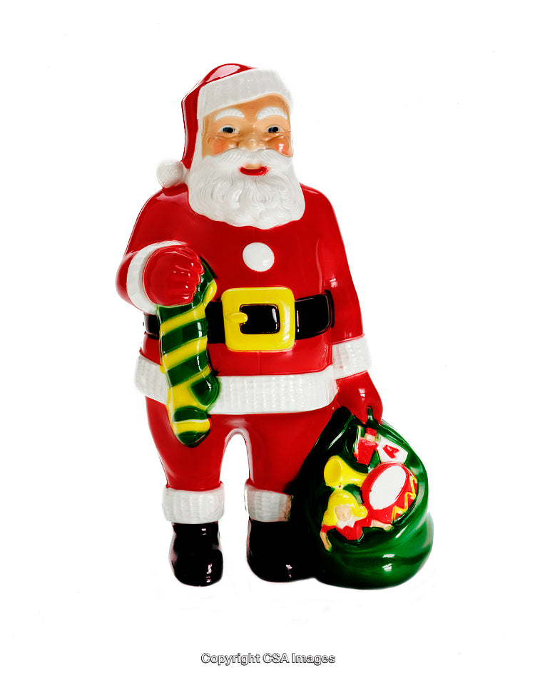 Festive Santa Claus Figurine Holding Green Bag of Toys in Holiday Spirit