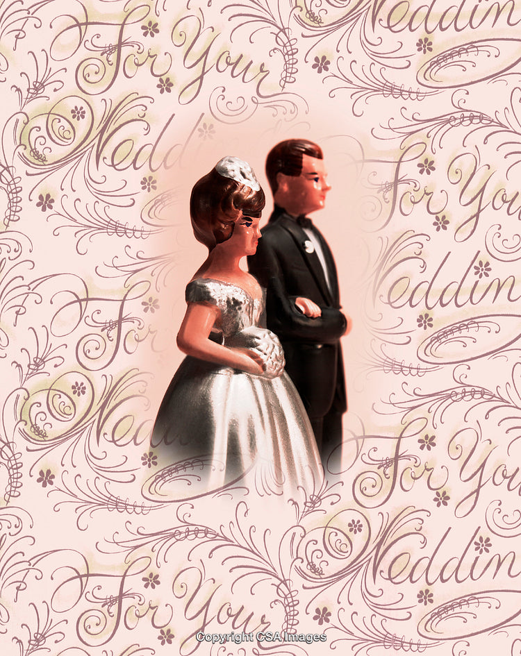 Classic Wedding Cake Topper Figures Against Decorative Background
