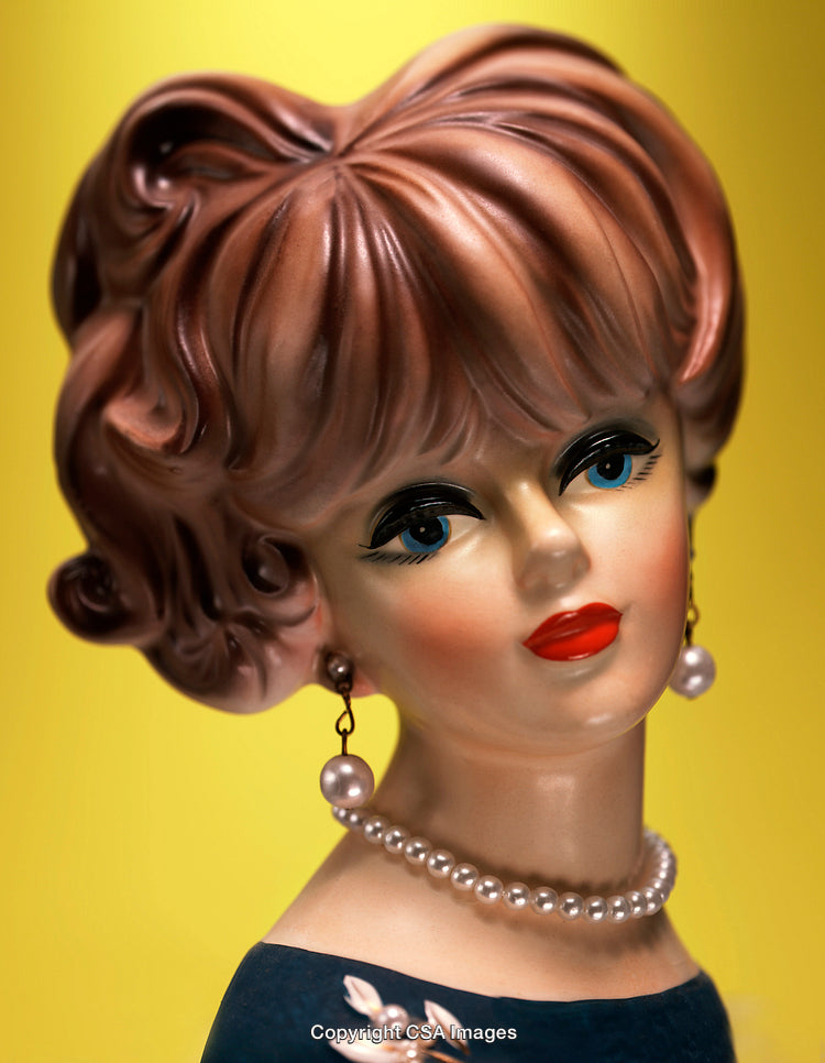 Vintage Ceramic Lady Figurine with Pearl Jewelry on Yellow Background