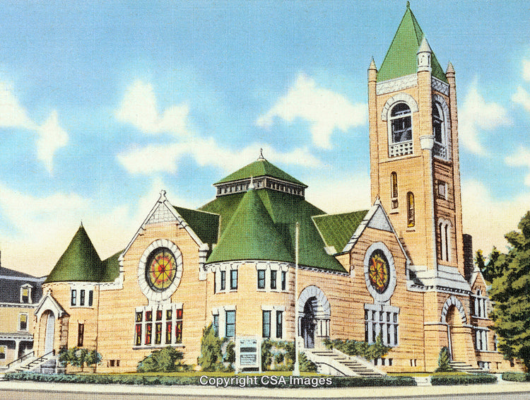 Historic Church Building with Green Roof and Steeple Under Blue Sky