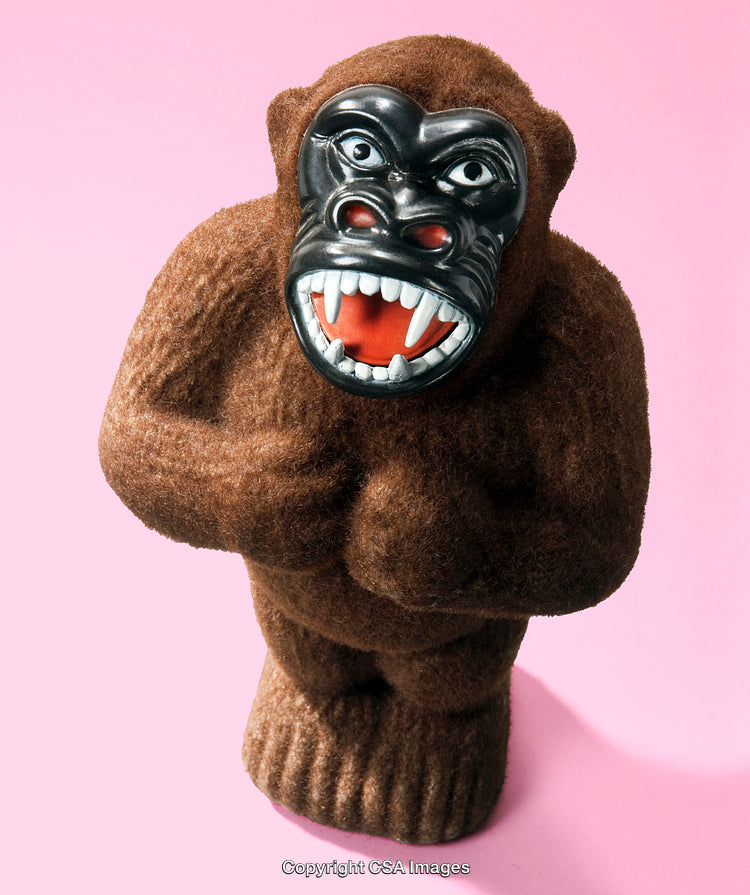 Vintage Toy Gorilla Statue With Pink Background