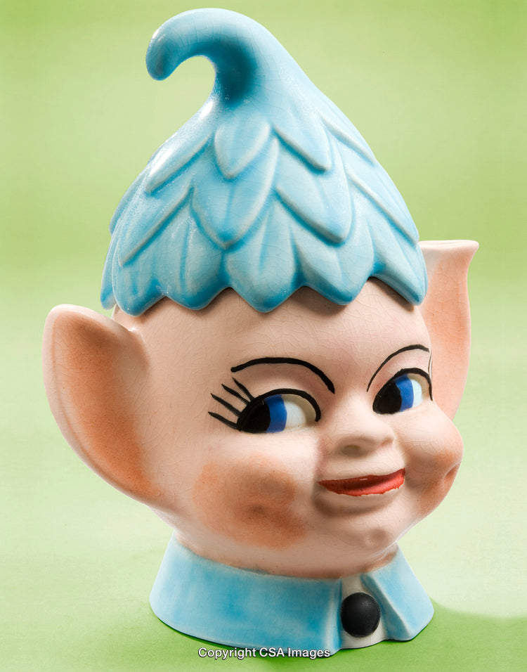 Whimsical Blue Hat Figurine on a Light Green Background