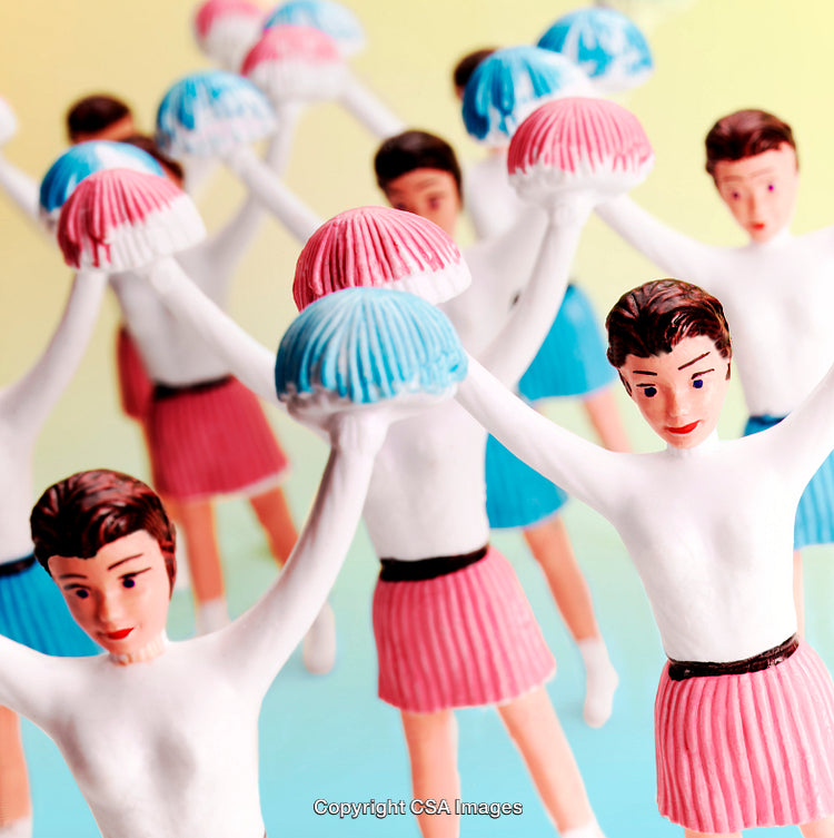 Colorful Plastic Cheerleader Figures Posed in Dynamic Uniform Formations