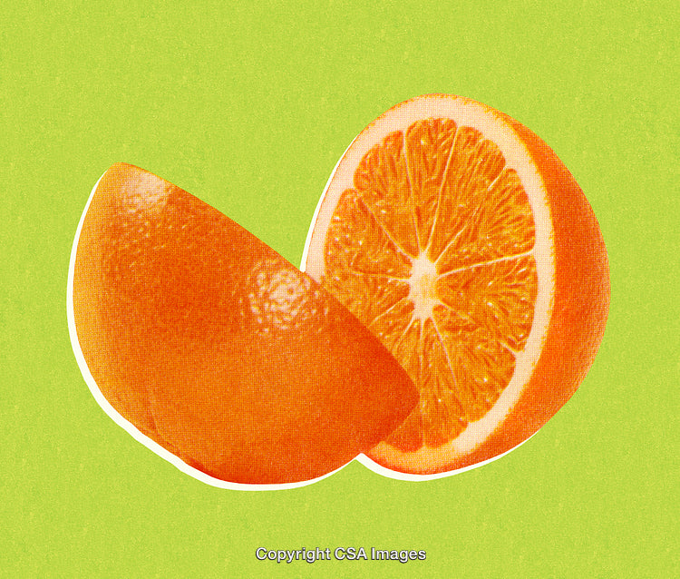 Close-Up of Half an Orange on a Vibrant Green Background