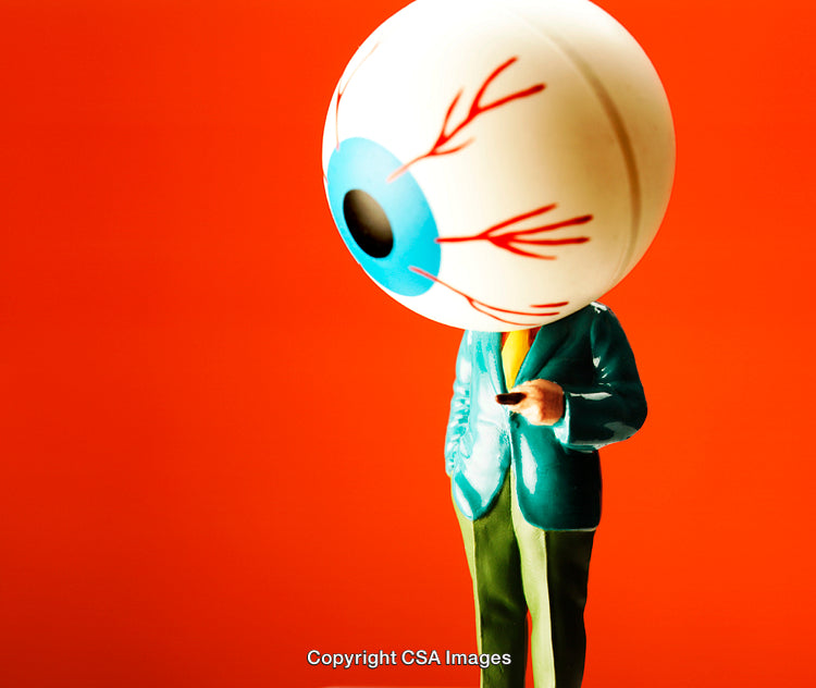 Colorful Figurine With Oversized Eyeball Head on Vibrant Orange Background