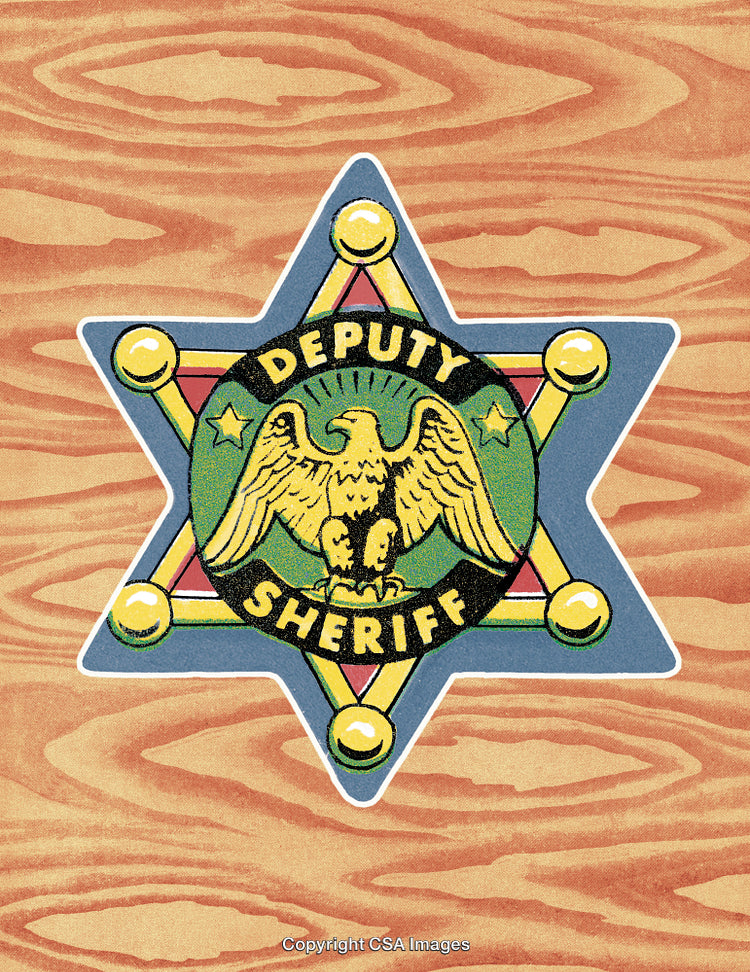 Vintage Deputy Sheriff Badge in a Star Design With Wooden Background