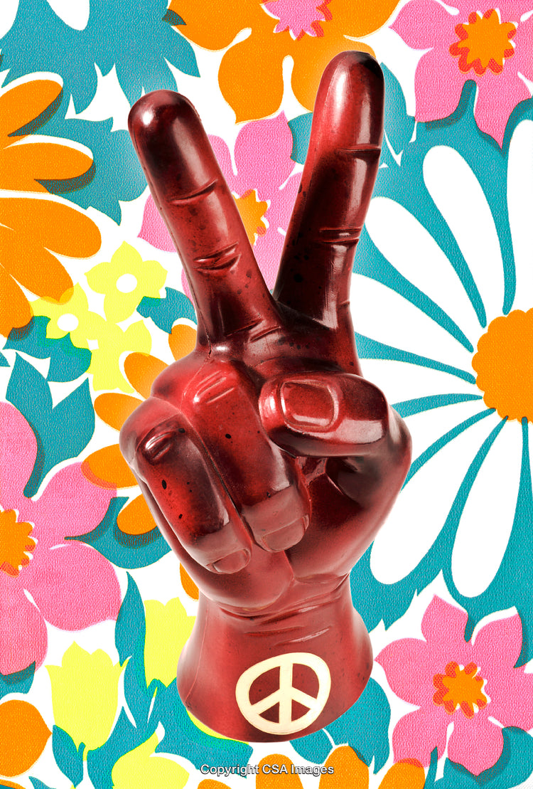 Red Peace Sign Figurine Surrounded by Vibrant Flower Child Inspired Background
